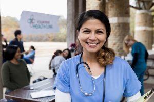 A female doctor smiling.